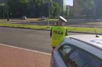 policjant mierzący prędkość