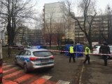 Policjanci wykonujący czynności na miejscu zdarzenia