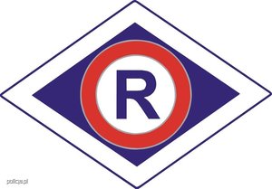 Zdjęcie przedstawia emblemat Policji - Wydział Ruchu Drogowego.
