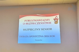 Zdjęcie przedstawia slajd o treści &quot;Porozmawiajmy o bezpieczeństwie. Bezpieczny senior debata społeczna 2024 rok Sosnowiec&quot;.